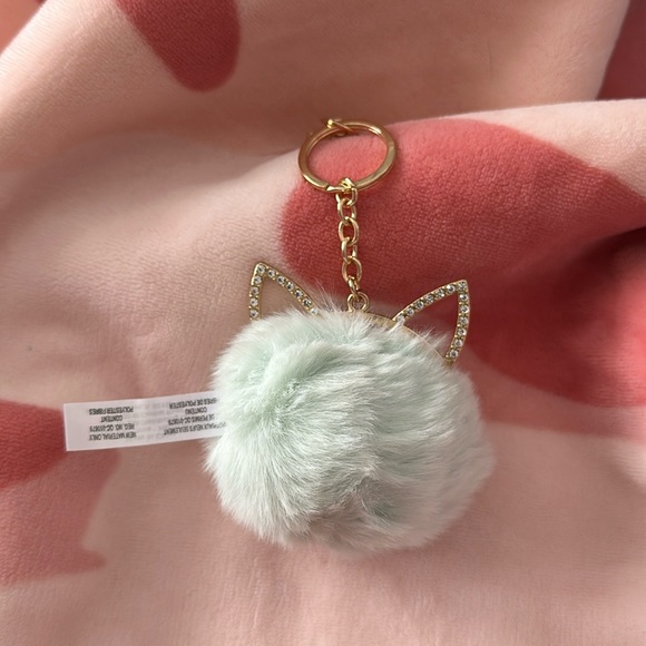 Claire’s Mint Green Furry Cat Pom Keychain - Picture 1 of 6